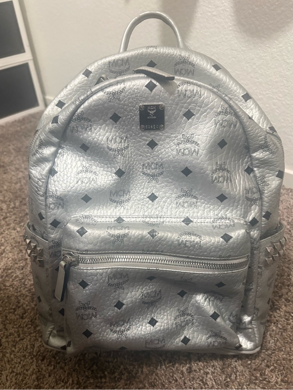 MCM Metallic Silver Monogram Backpack with Stud Accents - Picture 1 of 4